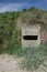 Low Newton, UK - A pill box on the beach at Low Newton, Northumberland