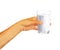 Low poly polygon hand is holding a glass of fresh milk delicious