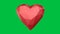 Low polygonal red heart on green screen