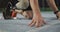 Low section of caucasian disabled male athlete with running blade getting ready to start a run