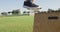 Low section of fit caucasian man exercising outdoors jumping on box