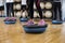 Low Section Of Friends Standing On Bosu Ball In Gym