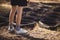 Low section of girl standing near tyre during obstacle course