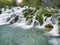 Low shutter speed of beautiful waterfalls, Plitvice lakes national park UNESCO, dramatic unusual scenic, green foliage alpine