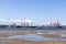 Low Tide in Durban Harbor with Ships Moored in Background