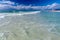 Low tide and Gentle Waves on the Aquamarine Waters of Siesta Key Beach near Sarasota, Florida