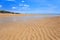 Low tide on golden sand beach