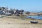 Low Tide Harbor Scene: Boats on Sandy Beach with Hugh Town, St. Mary\\\'s in the Background, Isles of Scilly, UK