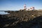 Low Tide at Head Harbor Lighthouse with Red Cross