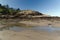 Low tide near rocks of Beards Hollow