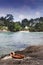 Low tide in Poludlu, Brittany, France, with a small rusted harbor ring