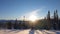 Low winter sun and mountain view in snowfield of Are Valadalen Fjall mountain in Jamtland in Sweden