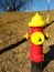 LOWELL MA / USA - JANUARY 09, 2020: Red and yellow fire hydrant manufactured by Kennedy Valves headquartered in Elmira, NY