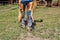 Lower body of a cowboy in boots with spurs