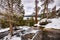 Lower Eagle falls on a cloudy winter day, Emerald bay and Lake Tahoe visible in the background