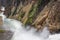 Lower falls Yellowstone river. Raging waters. Spray from waterfall.