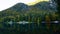 Lower lake of Laghi di Fusine in Autumn colours in Italy