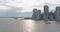 Lower Manhattan urban skyscrapers with water taxi boat Whitehall South Ferry Terminal, New York way from Staten Island