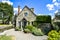 LOWER SLAUGHTER, THE COTSWOLDS, GLOUCESTERSHIRE, ENGLAND Cotswold stone cottages in summer afternoon sunlight