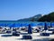 Lowered blue beach umbrellas. the concept of the end of the beach season. Greece, Thassos-September, 2014