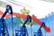 Lowering, falling graph on San Marino flag background - industrial illustration of San Marino oil industry or market concept. 3D