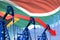 Lowering, falling graph on South Africa flag background - industrial illustration of South Africa oil industry or market concept.