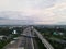 LRT , Monorail movement on track moving fast taken at station Cibubur. with background of traffic ,mountain and sky. Jakarta,