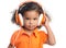 Lttle girl with an afro hairstyle enjoying her music on bright orange headphones