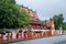 Luang Prabang, Laos - circa August 2015: Traditional Alms giving ceremony of distributing food to buddhist monks on the streets of