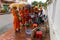 Luang Prabang, Laos - circa August 2015: Traditional Alms giving ceremony of distributing food to buddhist monks on the streets of