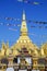 That Luang Stupa, landmark of Vientiane, Lao PDR., with pennant banners during Boun That Luang Festival