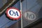Lubeck, Germany, January 15, 2022:  C & A advertising logo sign with reflection in a window on the facade of a shop, multinational