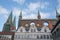 Lubeck Town Hall Renaissance Arbor and Gothic Shield Wall with St. Mary Church Marienkirche Tower - Lubeck, Germany