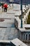 Lublin city street landscape, A man in red shirt is walking down the stairs