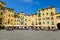 Lucca, Tuscany / Italy - October 10, 2019: View of Piazza dell`Anfiteatro, a famous elliptical square in the historic centre of