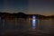 Lucerne by night with ferry wheel water reflection travel destination