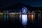Lucerne by night with ferry wheel water reflection travel destination