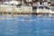 LUCERNE, SWITZERLAND - APRIL 13, 2016: Group of people canoeing during leisure time on Lake Lucerne Luzern with city in