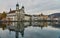 LUCERNE, SWITZERLAND - November 29, 2018: View of the Jesuitenkirche and houses  on the embankment of the Reuss river