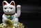 Lucky or fortune cat, Maneki-neko, has an attitude of calling and not greeting