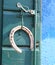 Lucky Horseshoe hanging from a window