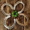 Lucky horseshoes arranged as a shamrock