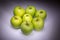 Lucky seven green apples