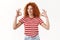 Lucky upbeat redhead curly-haired sassy stylish girlfriend striped t-shirt enjoy perfect summer vacation plan show okay