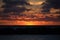 Ludington, Michigan, USA a beautiful red orange sunset over Lake Michigan.