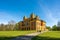 Ludwigsburg Castle Favoriten historic building in spring time with beautiful garden with flower and green grass and blue sky