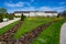 Ludwigsburg royal palace historic building in spring time with beautiful garden with flower and green grass and blue sky