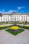 Ludwigsburg royal palace historic building in spring time with beautiful garden with flower and green grass and blue sky