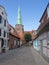 Luebeck Travemuende, narrow lane with church St. Lorenz