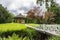 Luetetsburg Castle Gardens with Pavillon, White Wooden Bridge, and Trees